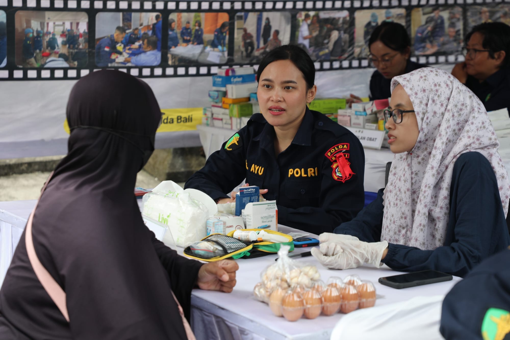 Biddokkes Polda Bali Hadirkan Layanan Kesehatan Gratis di Pasar Pangan Murah, Warga Antusias Periksa Kesehatan