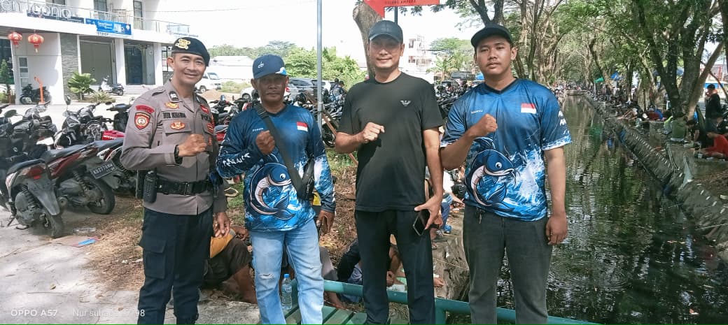 Jaga Kondusifitas Patroli Enggang Sambangi Event Mancing Warga di Ampera