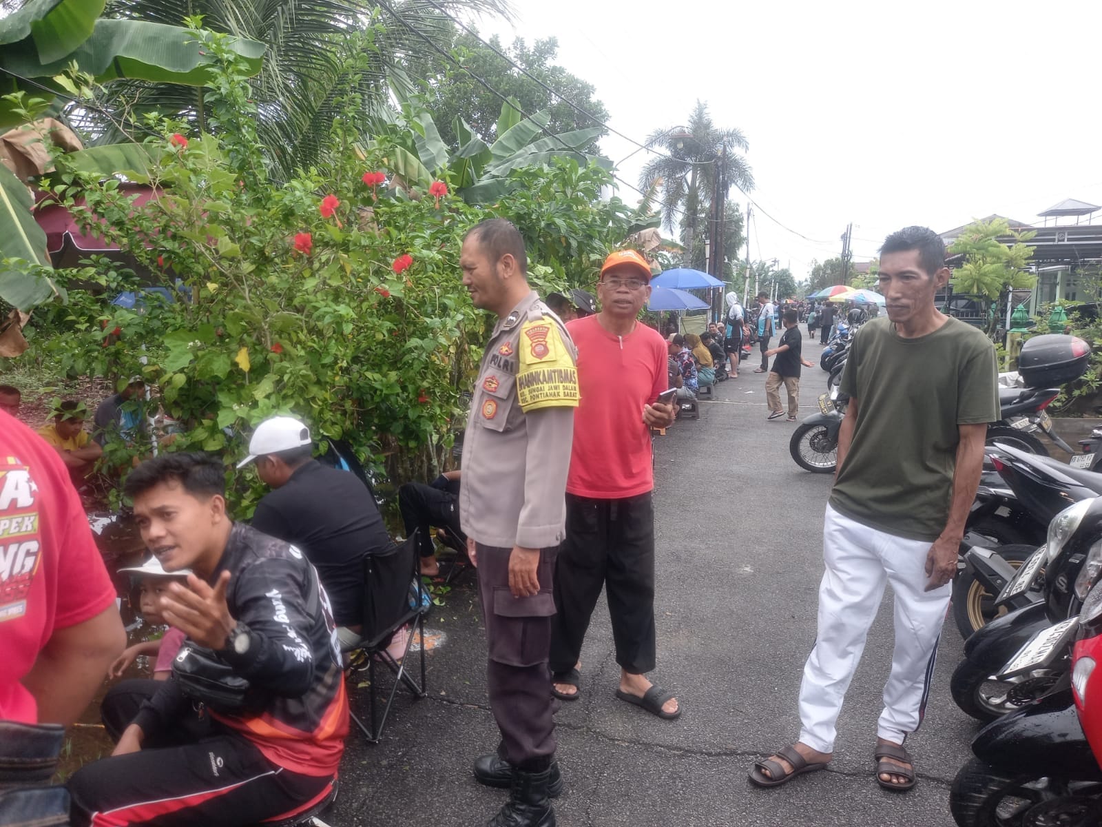 Bhabinkamtibmas Kelurahan Sei Jawi Dalam Laksanakan Pengamanan Kegiatan Mancing Lele, Sampaikan Himbauan Kamtibmas