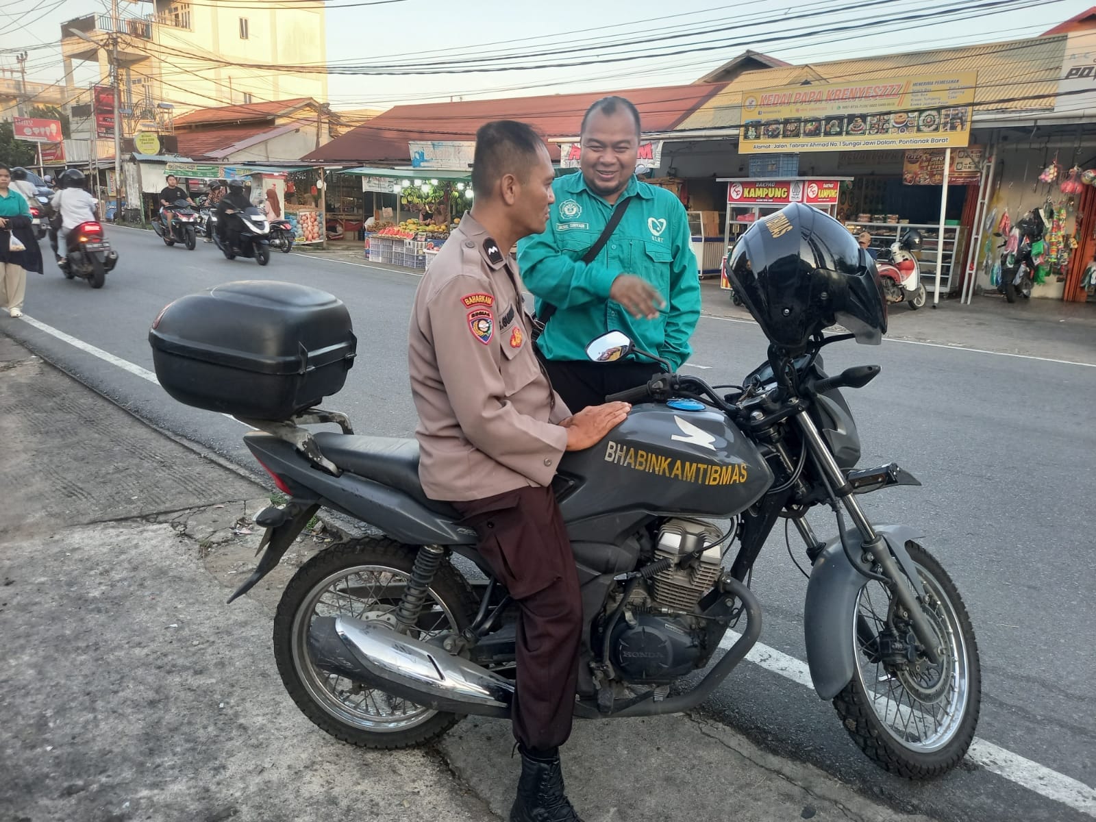 Bhabinkamtibmas Sei Jawi Dalam Sambangi Warga, Ajak Aktif Jaga Keamanan dan Ketertiban Masyarakat