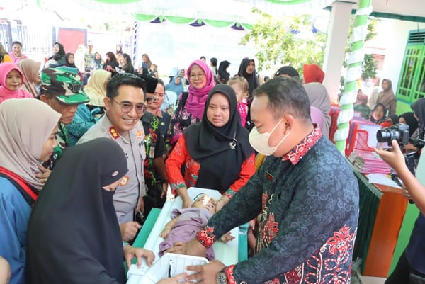 Dukung Kesehatan Masyarakat, Kapolres Kotim Hadiri Gebyar Posyandu Presisi