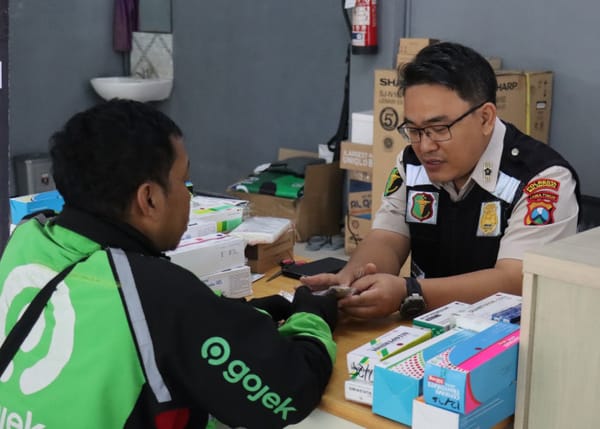 Ratusan Driver Ojol Dapat Layanan Medis Gratis dari Polresta Malang Kota