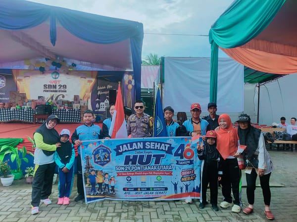 Bhabinkamtibmas Batulayang Hadiri Perayaan HUT ke-46 SD Negeri 29 Pontianak Utara